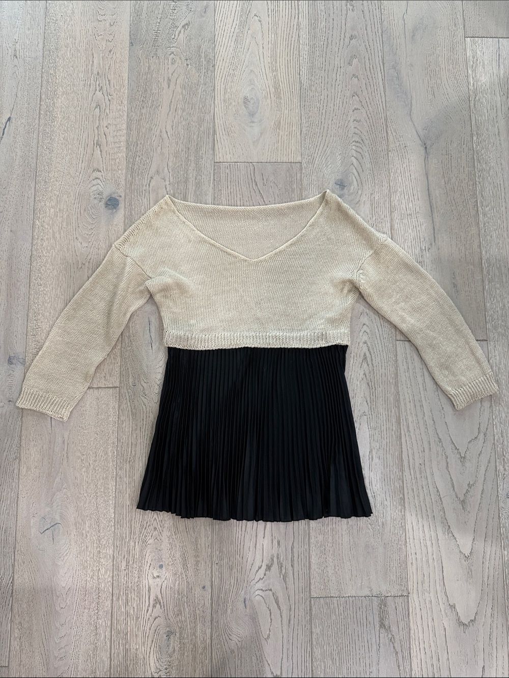 Beige Knit Top with Black Pleated Hem